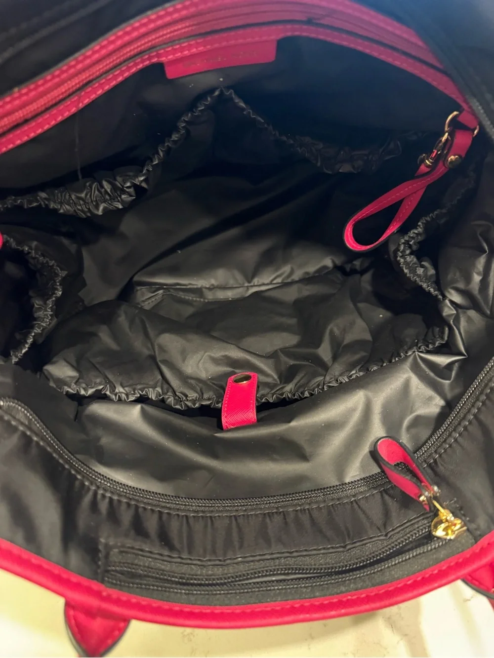 Michael Kors Black diaper bag  with Hot Pink Trim and Gold Accents